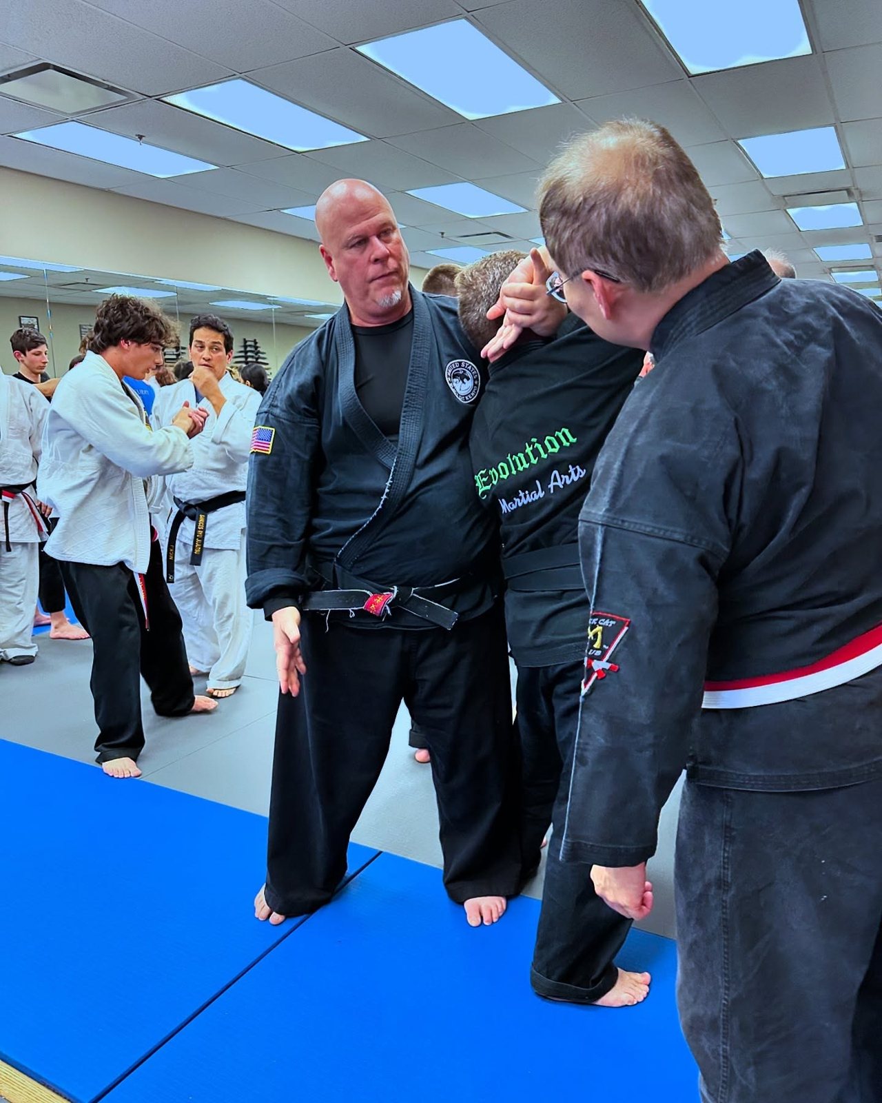 A Self-Defense student smiling proudly after class at Master Curry Karate Jujutsu Ryu in Staten Island