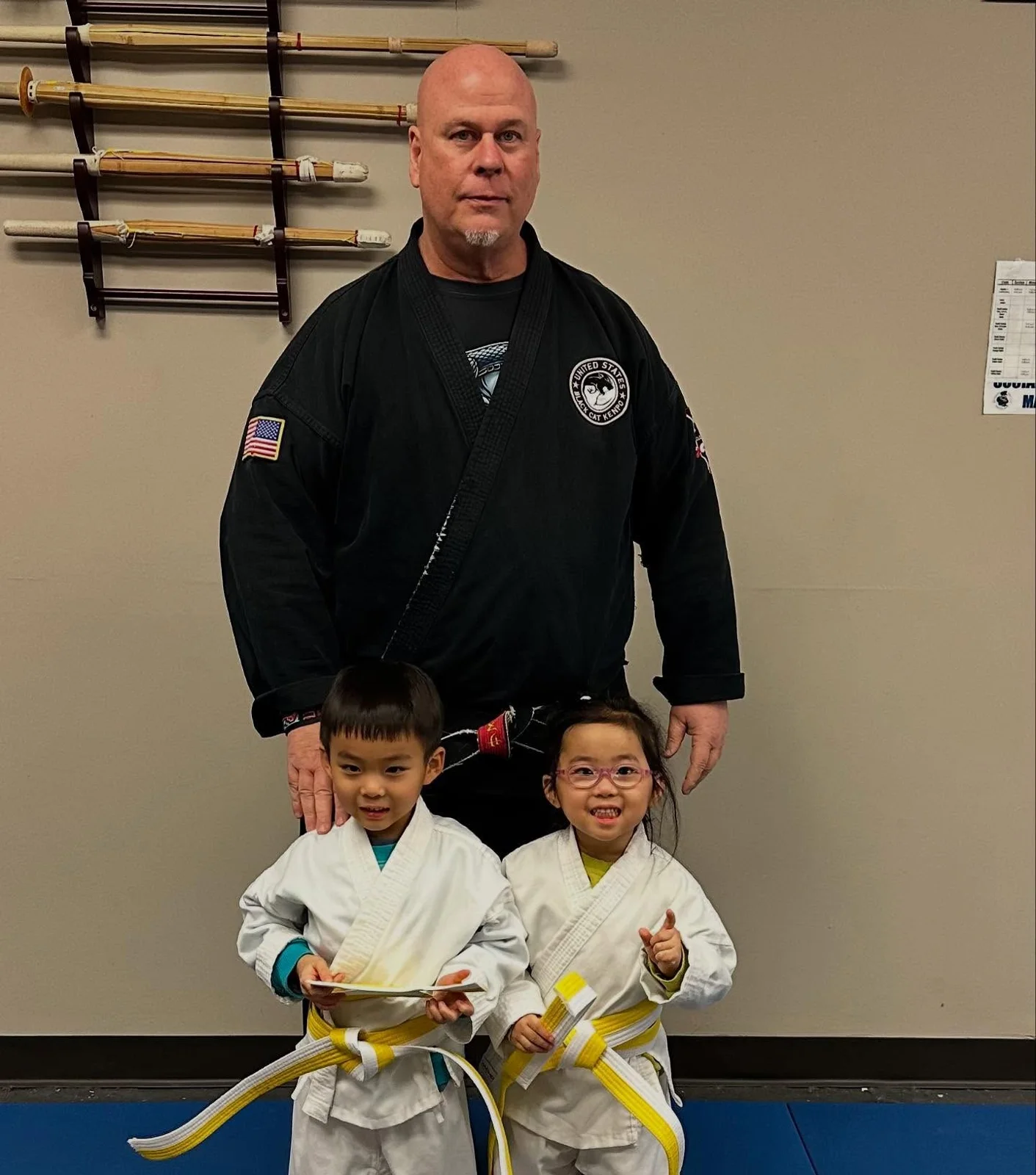 An instructor supervising Is Your Preschooler students closely during class at Master Curry Karate Jujutsu Ryu in Staten Island