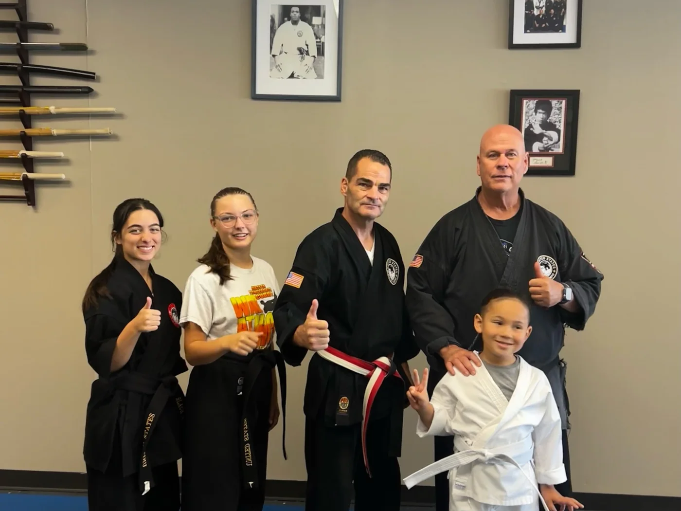 Students sharing a fist bump after class at Master Curry Karate Jujutsu Ryu in Staten Island